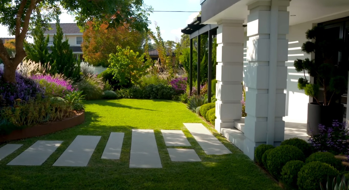 Modern landscape design with geometric stepping stones in lawn in Concord, CA